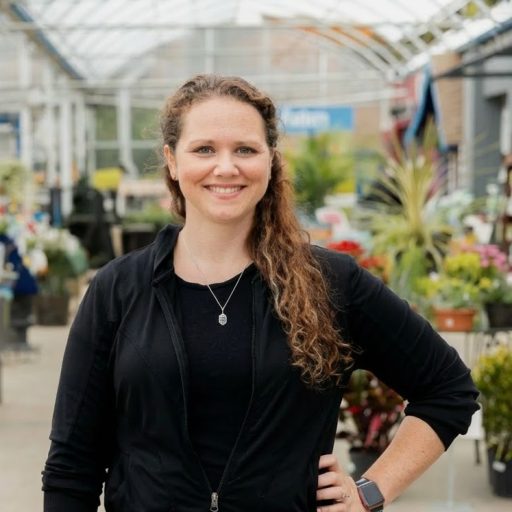 Women standing inside a garden center